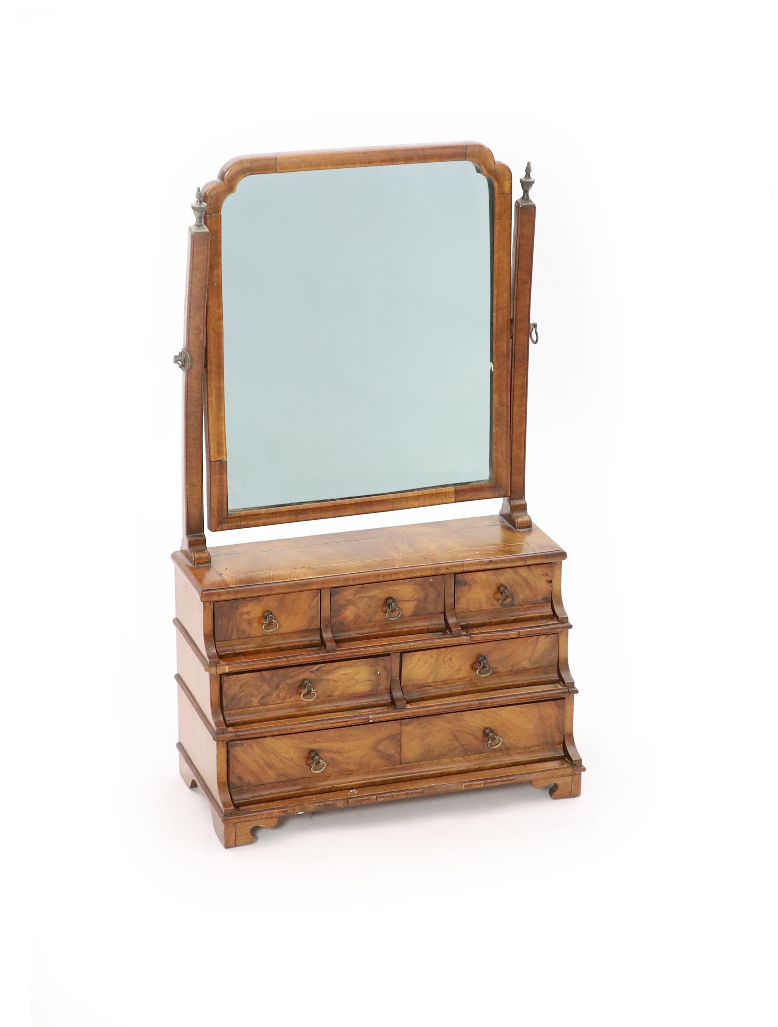 A Queen Anne walnut toilet mirror, W.46cm D.22cm H.77cm